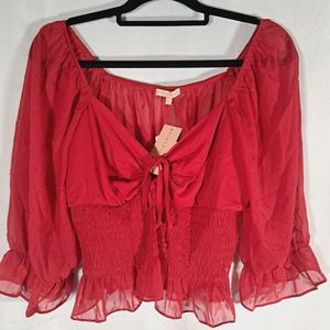 Evolutionary red sheer crop top with keyhole on front. Size XL. A4
